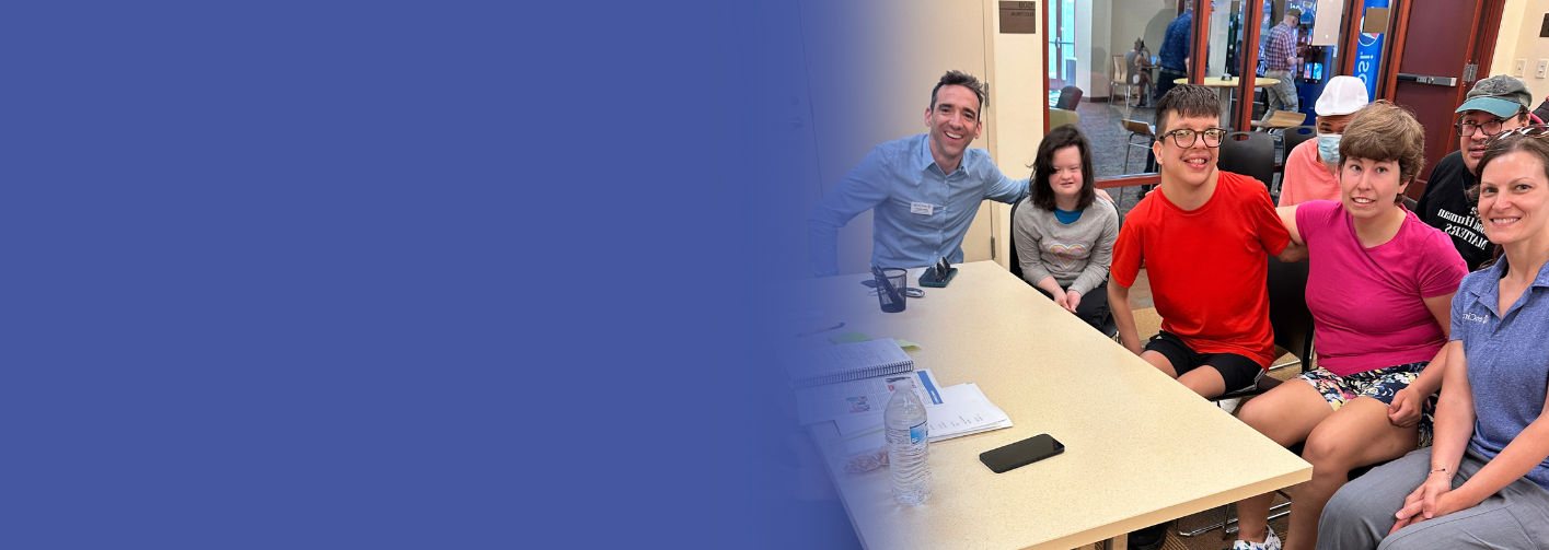 EnCircle staff and clients smile at the camera